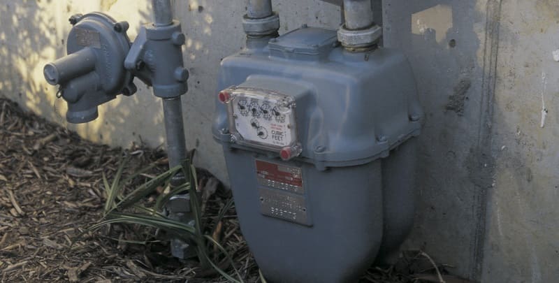 Picture of gas meter against wall of home