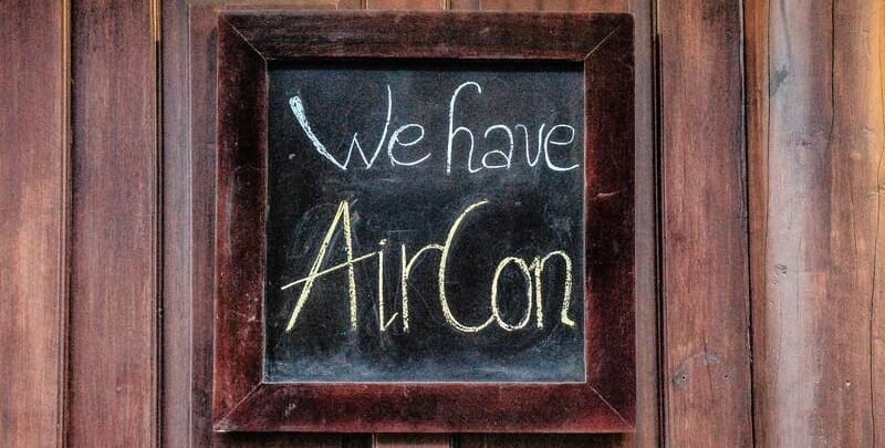 Is It Cheaper to Run a Split System Air Conditioner? Hand written sign indicating location has air conditioning