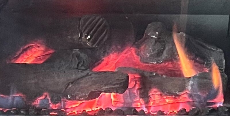 Close up shot of burning gas log fire.